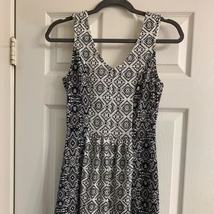 Black and white dress with cutout on the back.